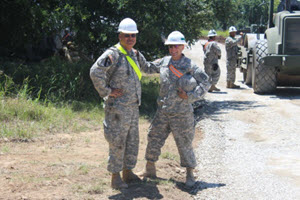 Courtesy Photo  Soldiers from the 420th Engineer Brigade pose for a photograph while participating in a 25-day roadway construction project spanning 17 miles along the perimeter of the Camp Bowie Training Center in Brownwood from July 6-30, 2015. (Texas National Guard courtesy photo by 111th Engineer Battalion/Released)